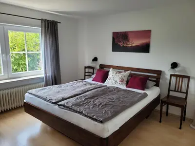 Ein Bett oder Betten in einem Zimmer der Unterkunft Ferienwohnung Kraichgaublick