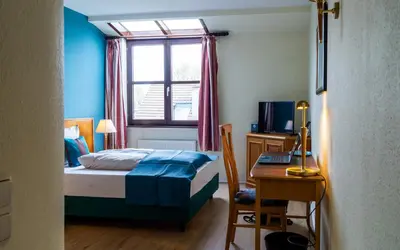 Ein Bett oder Betten in einem Zimmer der Unterkunft Trip Inn Bristol Hotel Mainz