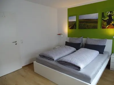 Ein Bett oder Betten in einem Zimmer der Unterkunft Rheinhessen Apartment