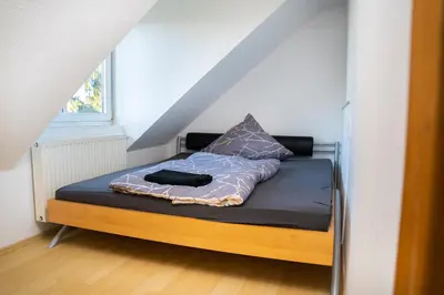 Ein Bett oder Betten in einem Zimmer der Unterkunft 153 m² Haus mit 6 Schlafzimmern für 12 Persoen