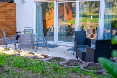 Ein Garten an der Unterkunft 153 m² Haus mit 6 Schlafzimmern für 12 Persoen