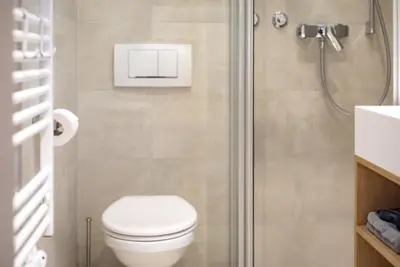 Ein Badezimmer in der Unterkunft Hotel Lehn
