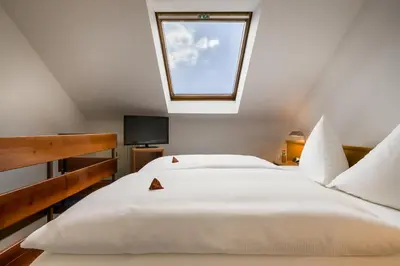 Ein Bett oder Betten in einem Zimmer der Unterkunft acora Karlsruhe Zentrum Living the City - Apartments
