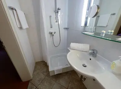 Ein Badezimmer in der Unterkunft Regina