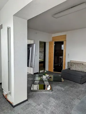 Ein Sitzbereich in der Unterkunft Pension Am Waldrand