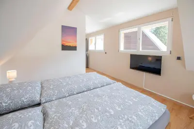 Ein Bett oder Betten in einem Zimmer der Unterkunft Lang´s Ferienhaus im Weschnitztal