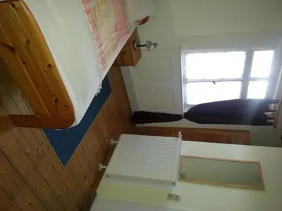 Ein Bett oder Betten in einem Zimmer der Unterkunft Hotel Blaues Haus
