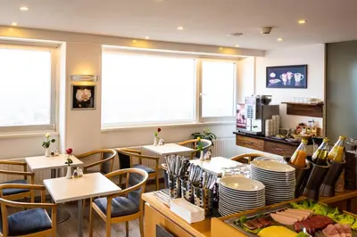 Ein Sitzbereich in der Unterkunft City Hotel Heilbronn