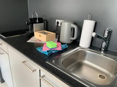 Küche/Küchenzeile in der Unterkunft Rooftop Apartment by Rabe - Balkon, Parkplatz, Smart-TV, Netflix