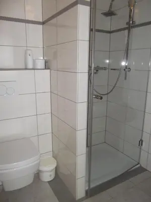 Ein Badezimmer in der Unterkunft Pension und Weingut Hirschhof