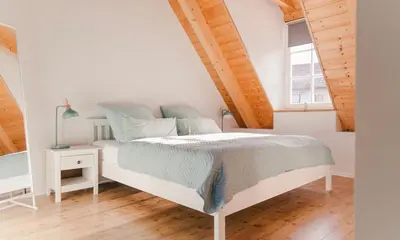 Ein Bett oder Betten in einem Zimmer der Unterkunft Grüne Pause
