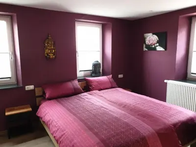 Ein Bett oder Betten in einem Zimmer der Unterkunft Schlafwelt - Thailand