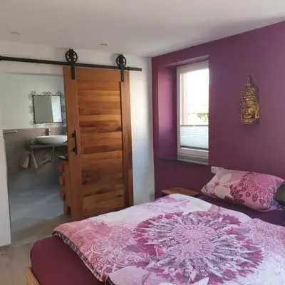Ein Bett oder Betten in einem Zimmer der Unterkunft Schlafwelt - Thailand