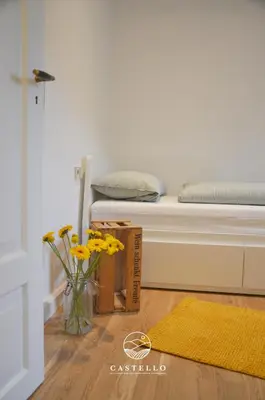 Ein Bett oder Betten in einem Zimmer der Unterkunft Die Gründerzeitvilla zwischen Weinstrasse und Pfälzer Wald