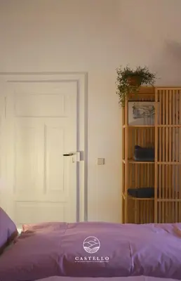 Ein Bett oder Betten in einem Zimmer der Unterkunft Die Gründerzeitvilla zwischen Weinstrasse und Pfälzer Wald