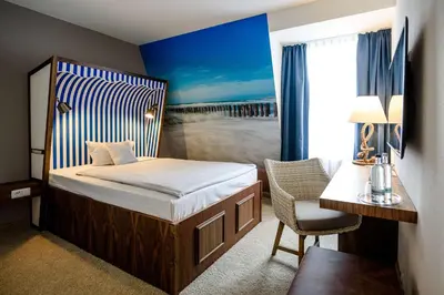 Ein Bett oder Betten in einem Zimmer der Unterkunft Dorint Hotel Alzey/Worms