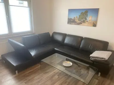 Ein Sitzbereich in der Unterkunft Ferienwohnung EG Heppenheim