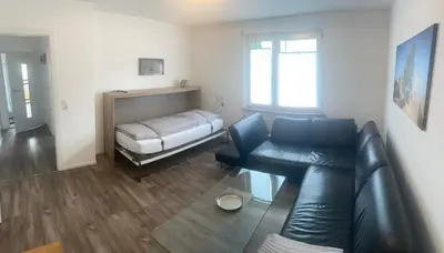 Ein Bett oder Betten in einem Zimmer der Unterkunft Ferienwohnung EG Heppenheim