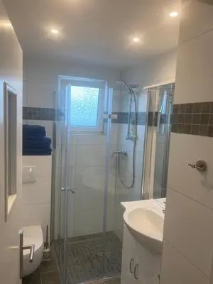 Ein Badezimmer in der Unterkunft Ferienwohnung EG Heppenheim