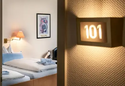 Ein Bett oder Betten in einem Zimmer der Unterkunft Sunibel Inn