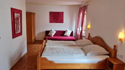 Ein Bett oder Betten in einem Zimmer der Unterkunft Hotel Kartäuser Hof Mainz Bodenheim