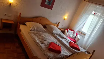 Ein Bett oder Betten in einem Zimmer der Unterkunft Hotel Kartäuser Hof Mainz Bodenheim