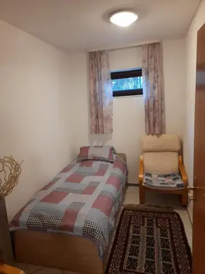 Ein Bett oder Betten in einem Zimmer der Unterkunft Gemütliche Unterkunft für Handwerker und Monteure