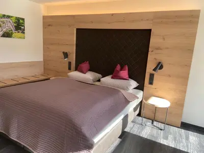 Ein Bett oder Betten in einem Zimmer der Unterkunft Hotel Koch
