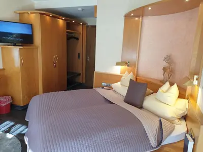 Ein Bett oder Betten in einem Zimmer der Unterkunft Hotel Koch