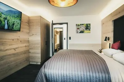 Ein Bett oder Betten in einem Zimmer der Unterkunft Hotel Koch