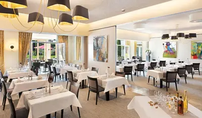 Ein Restaurant oder anderes Speiselokal in der Unterkunft Hotel Villa Medici