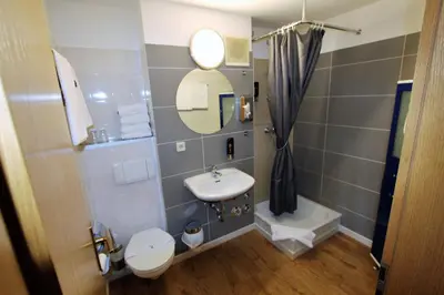 Ein Badezimmer in der Unterkunft Hotel Leo Mühlhausen