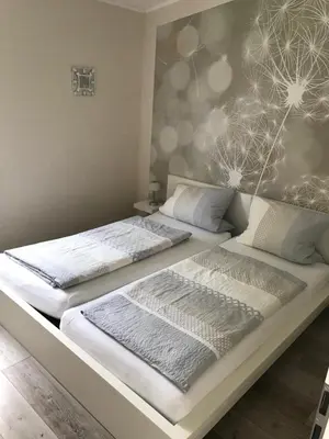 Ein Bett oder Betten in einem Zimmer der Unterkunft Ferienwohnung Stafflel - Wohlfühlen im Odenwald