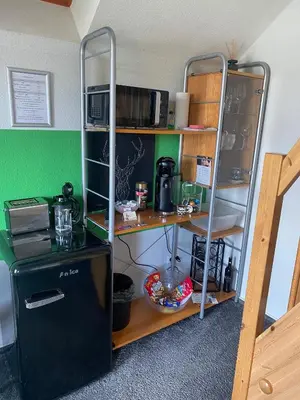 Küche/Küchenzeile in der Unterkunft SECRA Exclusive Maisonette-Ferienzimmer Am Backhausgarten