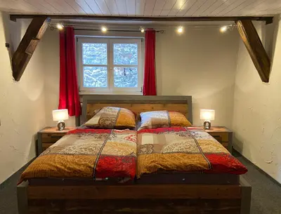 Ein Bett oder Betten in einem Zimmer der Unterkunft Appartement Schlossberg, Gasthaus Hirsch