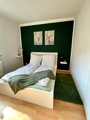 Ein Bett oder Betten in einem Zimmer der Unterkunft Die Zeitwohnung
