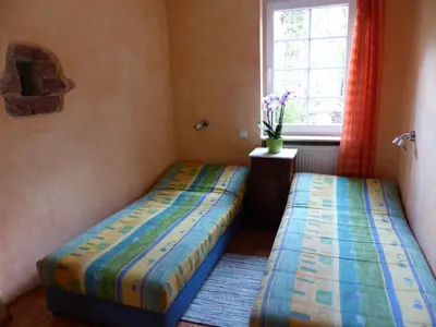 Ein Bett oder Betten in einem Zimmer der Unterkunft Ferienwohnungen Reichholdsmühle