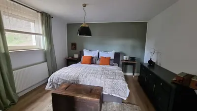 Ein Bett oder Betten in einem Zimmer der Unterkunft WEINBERG 16