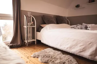 Ein Bett oder Betten in einem Zimmer der Unterkunft Pfälzer Herzel