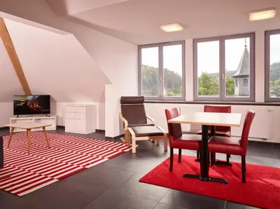 Ein Sitzbereich in der Unterkunft Luxusapartment Burgschänke
