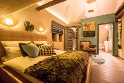 Ein Bett oder Betten in einem Zimmer der Unterkunft Farmerhaus-Lodge