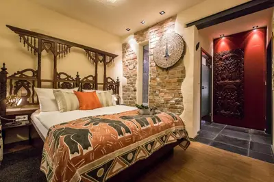 Ein Bett oder Betten in einem Zimmer der Unterkunft Farmerhaus-Lodge