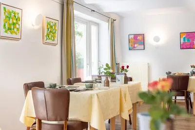 Ein Sitzbereich in der Unterkunft Villa Benz Hotel garni