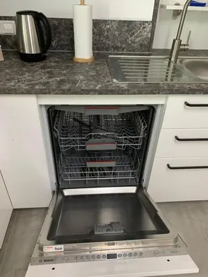 Küche/Küchenzeile in der Unterkunft Firmen & Ferienwohnung Brecht 2