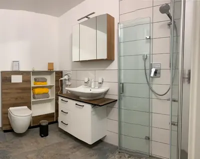 Ein Badezimmer in der Unterkunft Firmen & Ferienwohnung Brecht 2