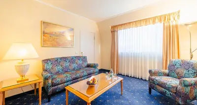 Ein Sitzbereich in der Unterkunft The Q - Quadro City Hotel