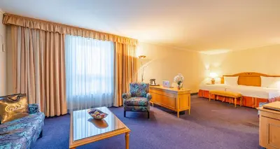 Ein Bett oder Betten in einem Zimmer der Unterkunft The Q - Quadro City Hotel