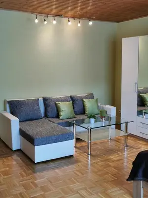 Ein Sitzbereich in der Unterkunft Hotel Mainperle