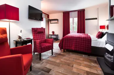 Ein Bett oder Betten in einem Zimmer der Unterkunft Hotel & Restaurant Grenzhof