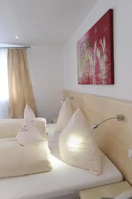 Ein Bett oder Betten in einem Zimmer der Unterkunft Hotel-Restaurant Steuermann